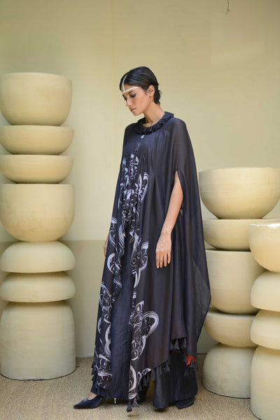 Printed cape top with pants.