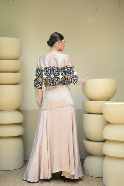 The eye of the leaf jacket and skirt sets.