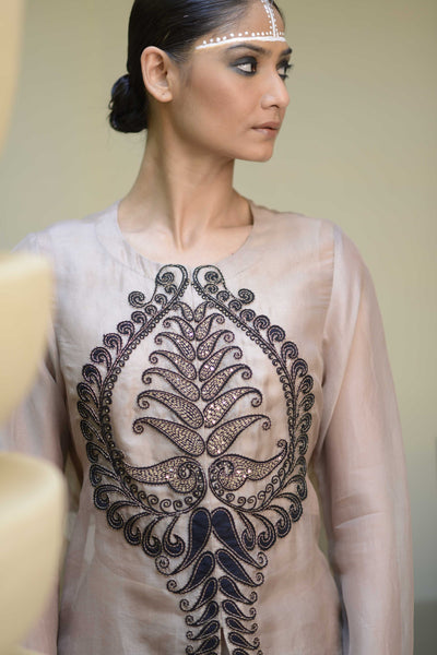 Embroidered jacket with pants.