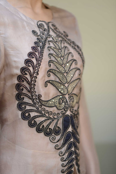 Embroidered jacket with pants.